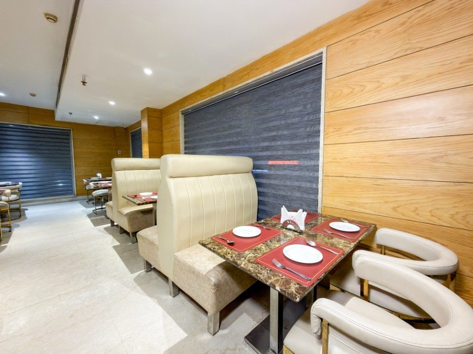 Banquette seating at Sakun restaurant, Hotel Sawera Grand, Amritsar