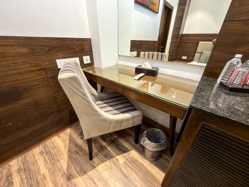 Writing desk and seating in the Executive Triple Room, Hotel Sawera Grand, Amritsar